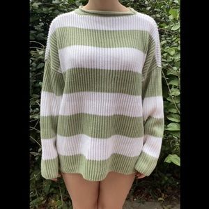 Green and white striped sweater